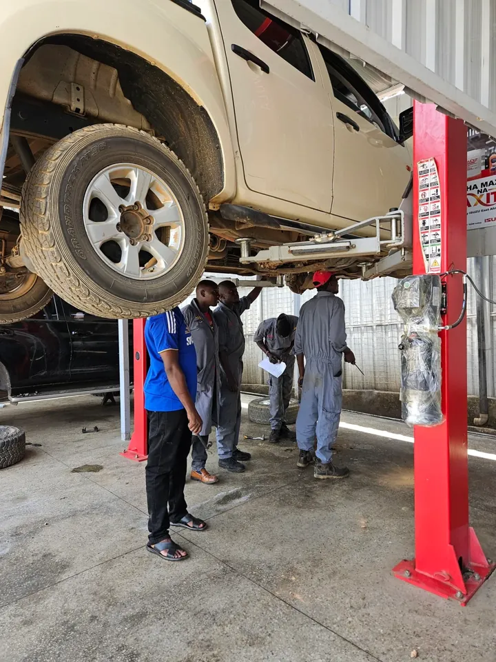 Under-body inspection. Checked before anything is recommended